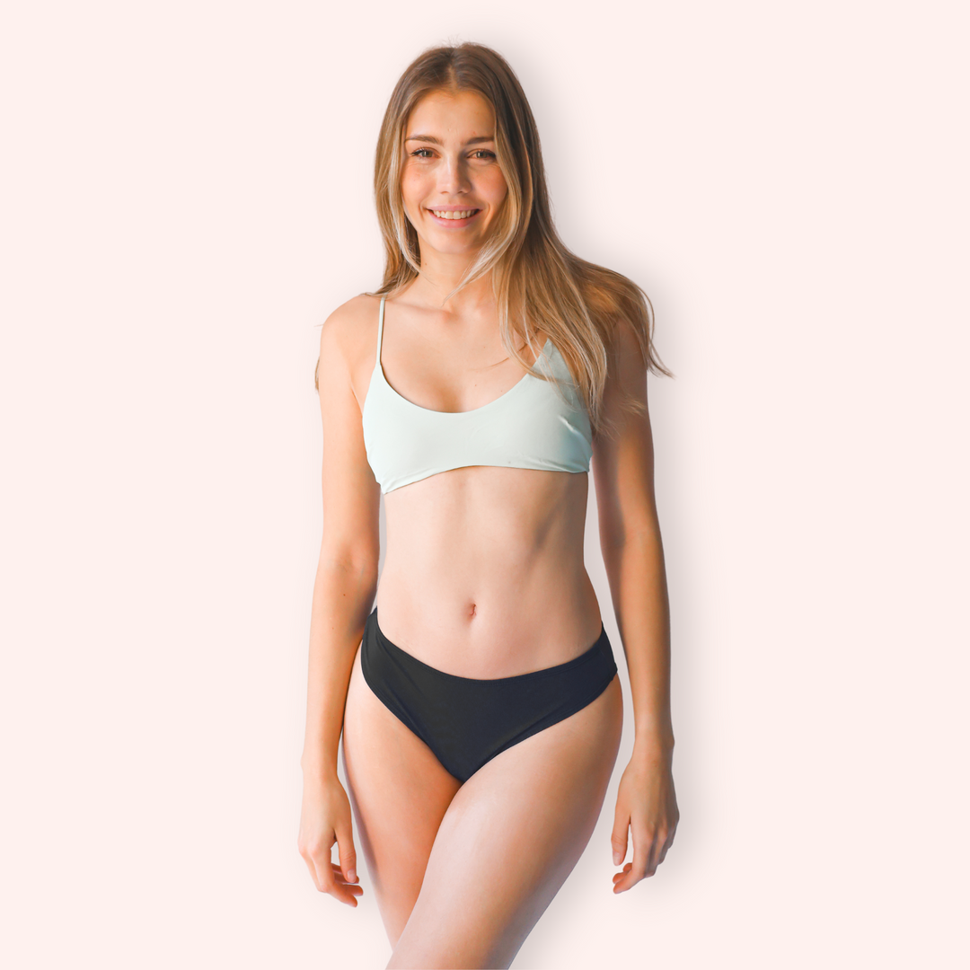 Don't let your tween miss out on swimming during her period. With Blushproof Period Swim Bottoms, she can swim even without a tampon. Top not included.